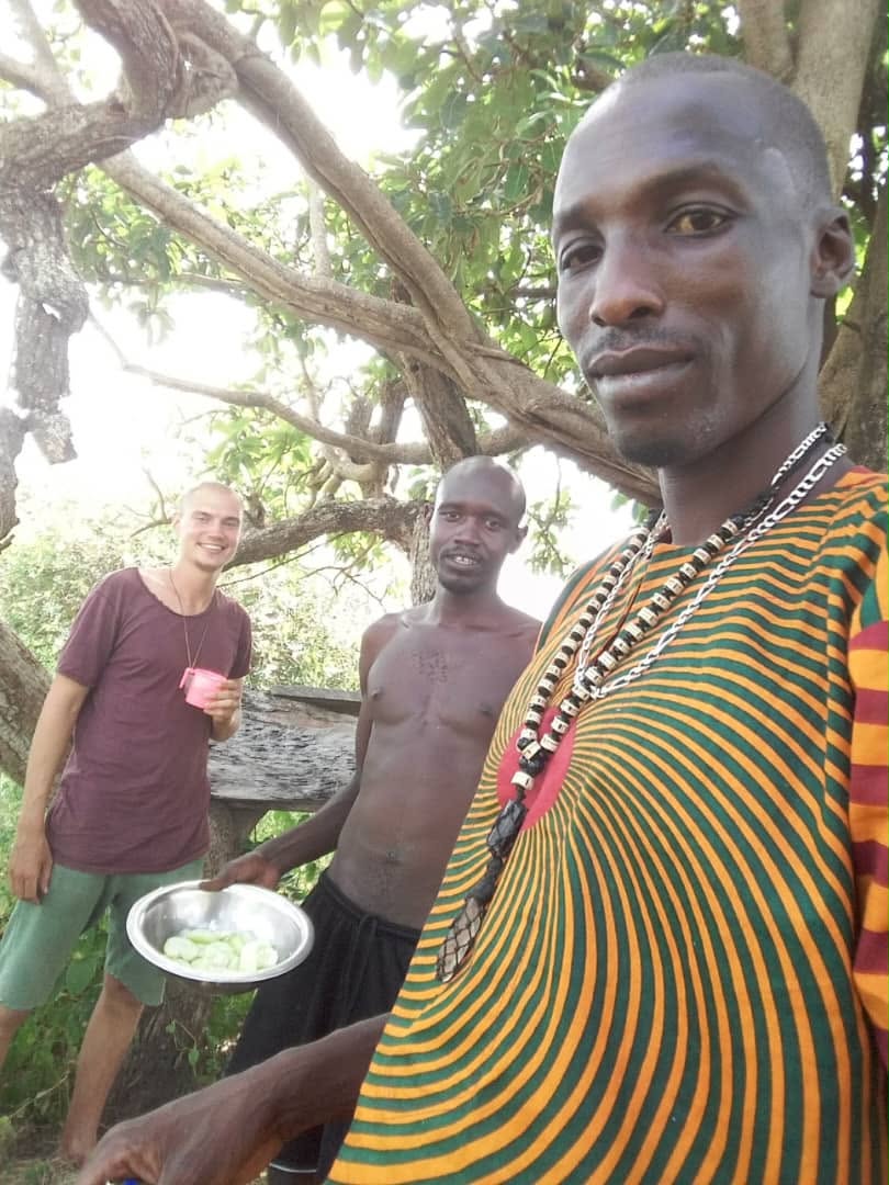 SunnyTribe friends under the tree in Kafountine