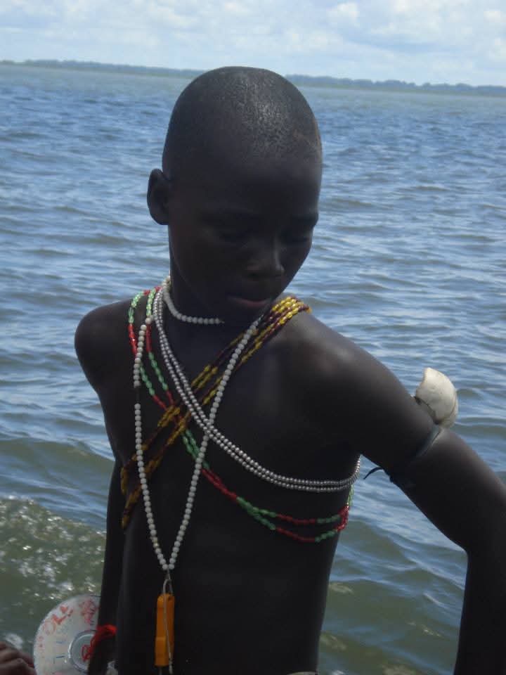 Boy with traditional beads